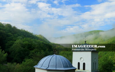Monastery Gornjak rooftops with mist in the background